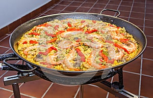 Traditional spanish paella cooked in a pan
