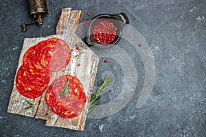 Traditional spanish sausage chorizo on a wooden board. banner, menu, recipe place for text, top view