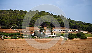 Traditional spanish white washed villa, guest house and hotel near hiking path on Sea coast in Atalis nature park near Sant Tomas