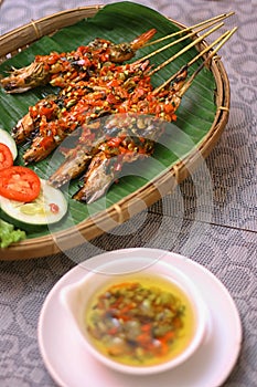traditional spicy grilled prawn skewers from Indonesia