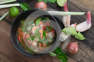 Traditional spicy prawn soup with galangal, lemongrass, kaffir lime leaf and straw mushrooms