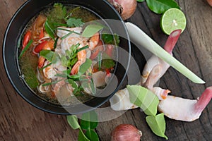 Traditional spicy prawn soup with galangal, lemongrass, kaffir lime leaf and straw mushrooms