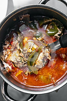 Traditional spicy tomato and egg soup stew in madeira portugal