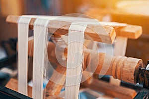 Traditional spinning wheel machine for making natural silk from silkworm