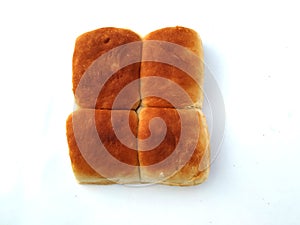 A traditional square loaf of bread is  on a white background. bread isolated on a white background.