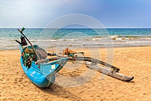 Traditional Sri Lankan fishing boat on the coast