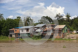 Traditional stilt house on Tonle Sap River near Ph