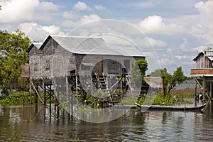 Traditional stilt house in the village near Phumi