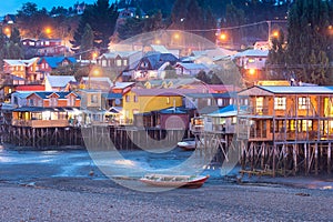 Traditional stilt houses know as palafitos in the city of Castro at Chiloe Island in Chile photo