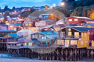 Traditional stilt houses know as palafitos in the city of Castro at Chiloe Island in Chile photo