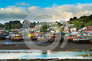 Traditional stilt houses know as palafitos in the city of Castro at Chiloe Island photo