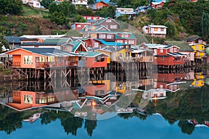 Traditional stilt houses know as palafitos in the city of Castro at Chiloe Island photo