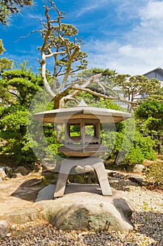 Traditional stone lantern (toro) in Takamatsu castle, Japan