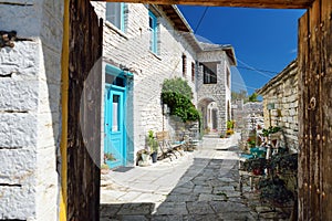 Traditional stone-made buildings and stone walkway of Monodendri village, Zagoria area, Epirus, north-western Greece