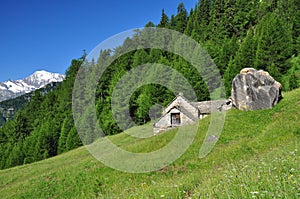 Traditional stone mountain architecture. Alpine house