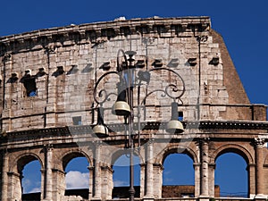 a traditional street lantern, in front of the Colosseum, Rome, Italy