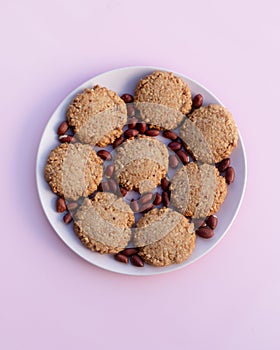 Traditional Sudanese Full Sudani cookies with peanuts. Close-up of homemade cookies on a bright background. Gluten-free peanut
