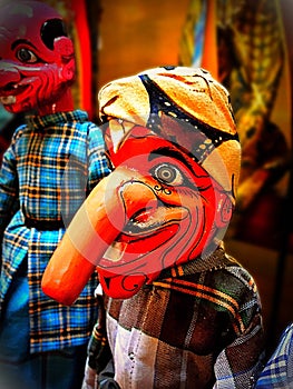 A traditional Sundanese handmade wooden puppet, name unknown. photo
