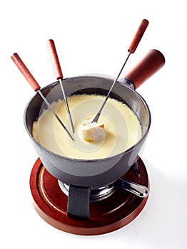 Traditional Swiss cheese and wine fondue photo