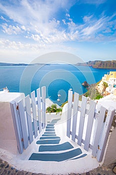 A traditional symmetric door yard, Ia, Santorini, Greece. Honeymoon summer aegean cycladic background.