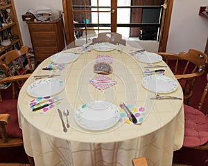 a traditional table setting all ready for a family holiday meal