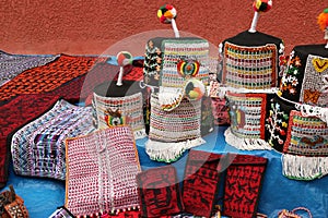 Traditional Tarabuco handbags and head wears, Bolivia