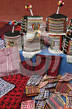 Traditional Tarabuco purses and women`s caps, Bolivia