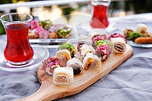 Traditional tea with locum sweets Turkish delight.