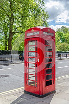 Traditional telephone booth in London United Kingdom UK photo