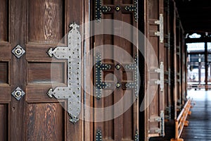 Traditional temple wood door in Hongan-ji, Kyoto, Japan