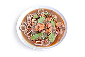 Traditional Thai flavor spicy food on white background, Pad ka prao is a famous food of Thailand