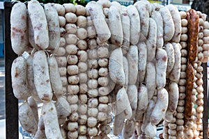 Traditional Thai food, pork sausage at street market, Thailand