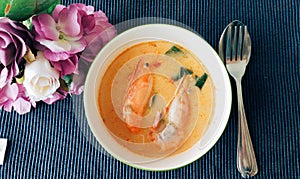 Traditional Thai food with spicy and prawns in a ceramic cup decorated with stainless steel.