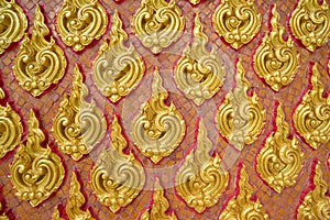 Traditional Thai Sculpture and pattern in wall of temple