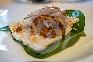 Traditional Thai snack with leaves and rice crackers with dipping suace