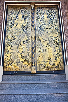 Traditional Thai style art gold painting pattern on the door