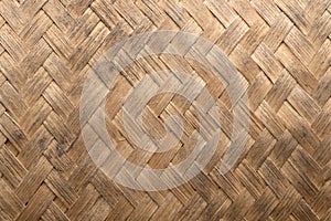 traditional thai style pattern nature background of brown handicraft weave texture bamboo surface for furniture materia