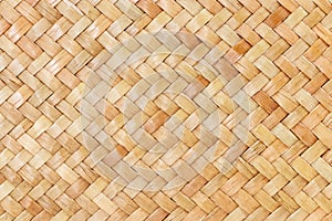 Traditional thai style pattern nature background of brown handicraft weave texture wicker surface for furniture materia