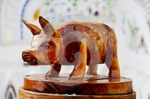 Traditional Thai style wood carving as animal wooden pig one of