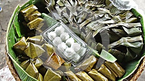 Traditional Thai sweets wrapped in banana leaves