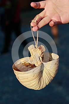 A traditional Thai water scoop or `Dog water scoop` typically used for scooping water from the river and lake which are made with