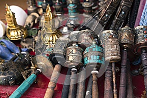 Traditional tibetan praying wheels in Nepal.