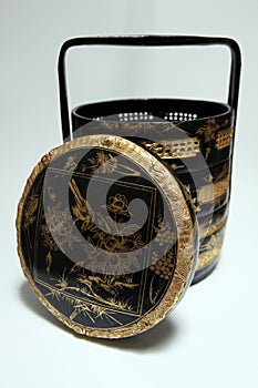 Traditional tiered oriental chinese basket tiffin photo