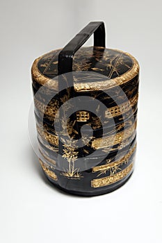 Traditional tiered oriental chinese basket tiffin photo