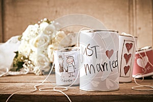 Traditional Tin Can Wedding Decorations on Table