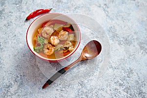 Traditional Tom Yum spicy Thai soup with shrimp