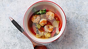 Traditional Tom Yum spicy Thai soup with shrimp