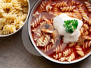 Traditional tomato soup with noodles, whitened with cream