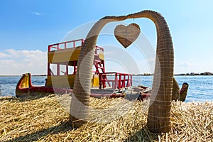 Traditional Totora reed boat on the Uros Islands of Lake Titicaca, Peru