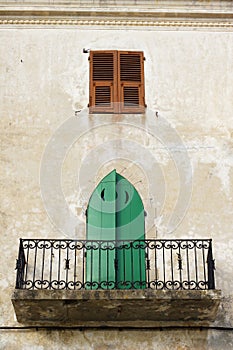 Traditional, town house balcony in Calvi Corsica